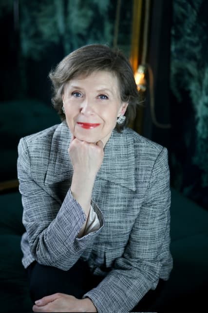 Ann-Christine Larsson, reflective studio portrait